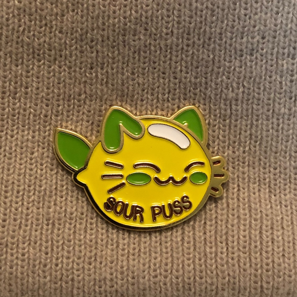 Sour Puss Lapel Pin! 💚💛